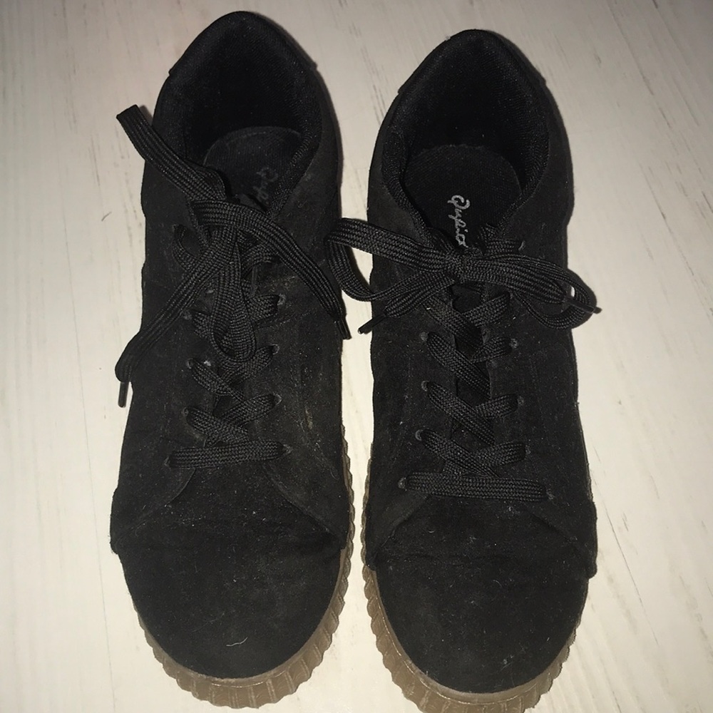 Black platform sneakers